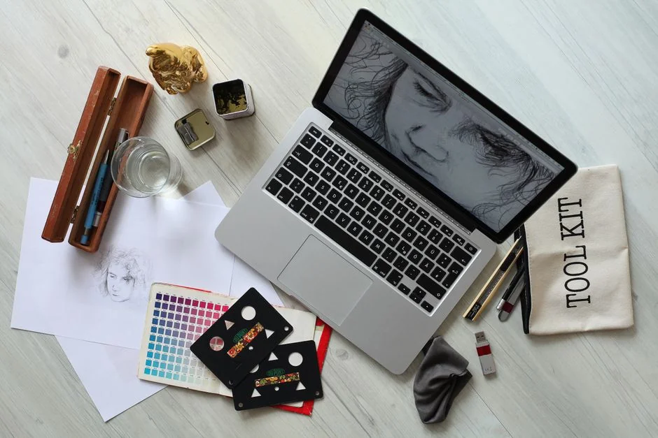 A focused designer is working on a user-centered project in a modern office setting.